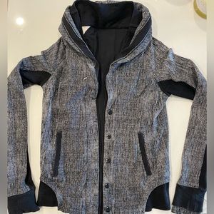 Lululemon black/grey/white sweater/jacket. Fits size 6-8.